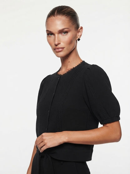 Elegantna crna vestica s puf rukavima | L